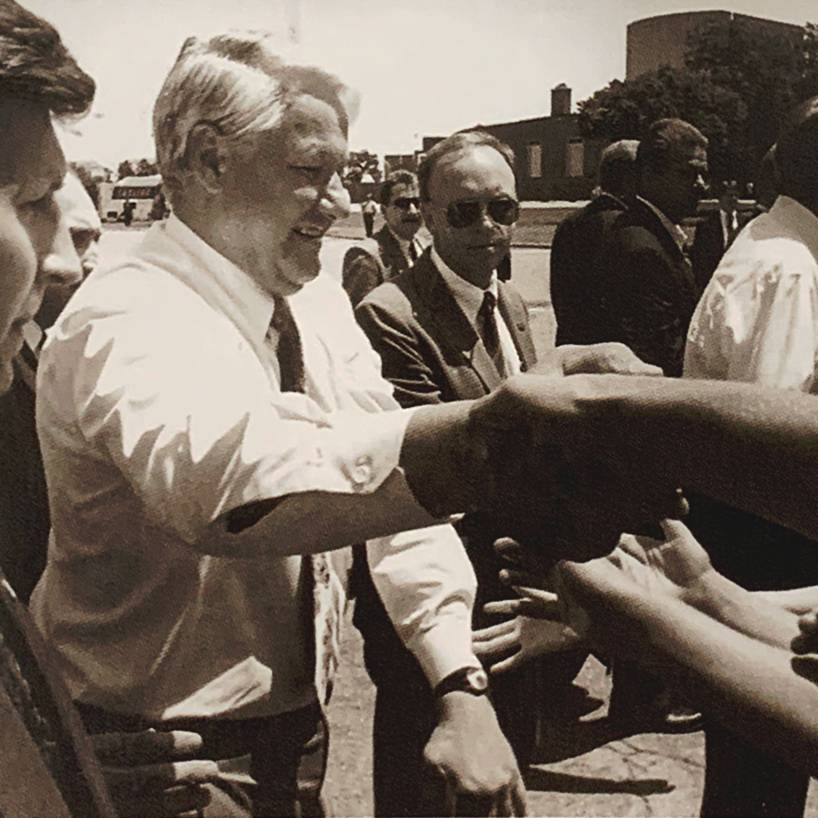 Russian President Boris Yeltsin shakes hands with students at ͷ State during a 1992 appearance